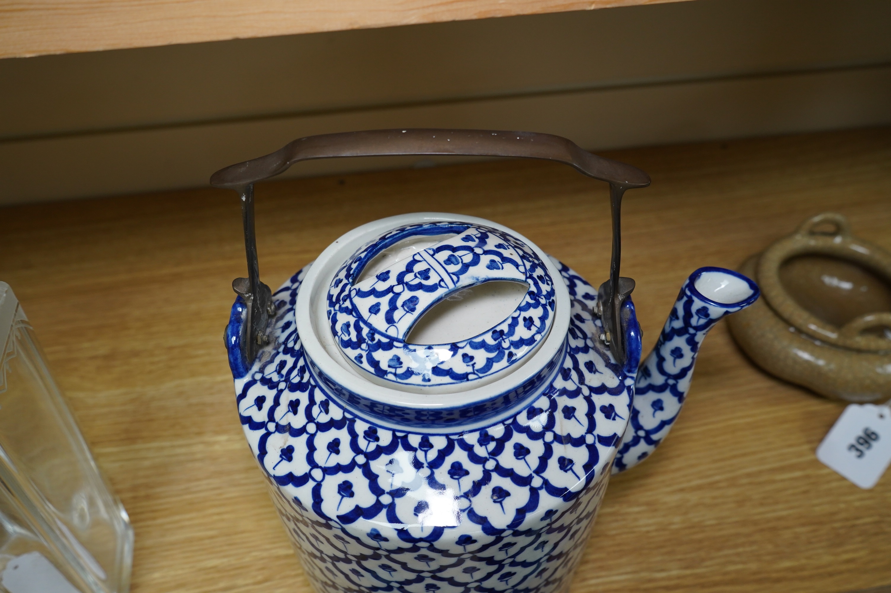 A large Chinese porcelain blue and white teapot, 28cm total. Condition - good